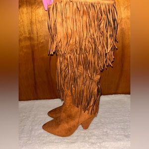 Fringe knee high heeled boots